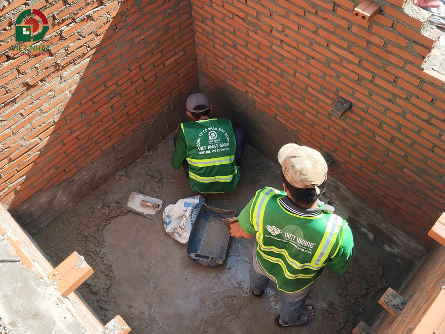 Hình ảnh thi công xây tô hố pit thang máy