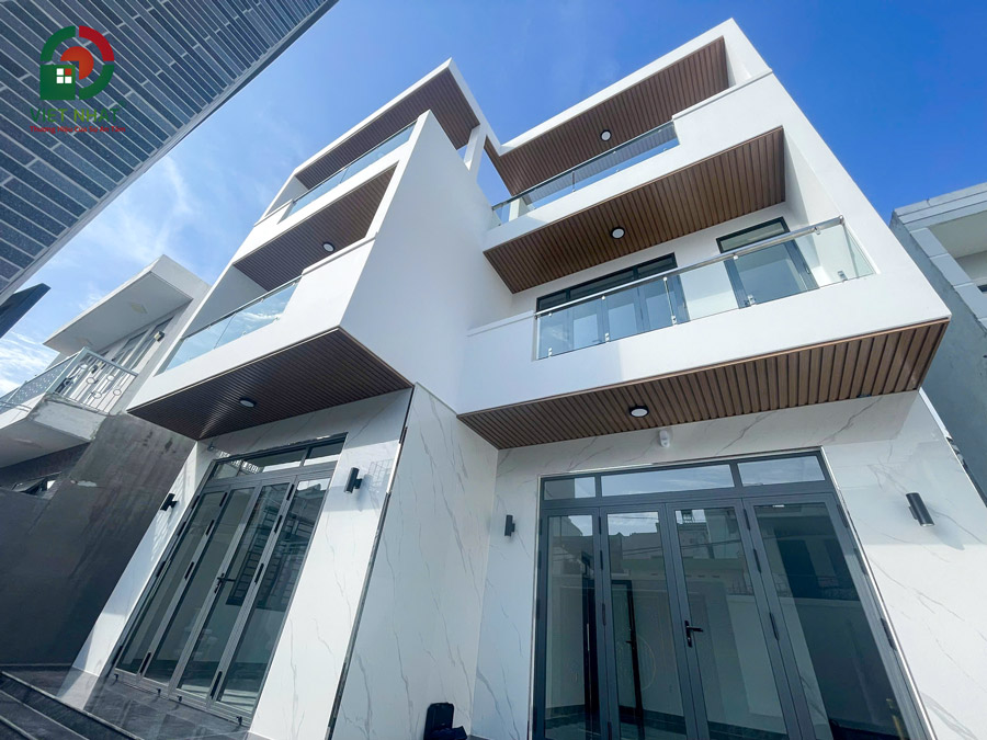 Hình ảnh bàn giao mặt tiền nhà 1 trệt 2 lầu sân thượng 2 căn liền kề