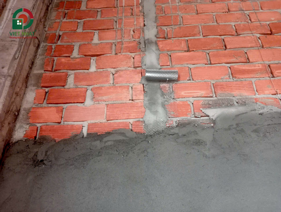 Hình ảnh thi công đóng lưới mắt cáo tô tường chống nứt