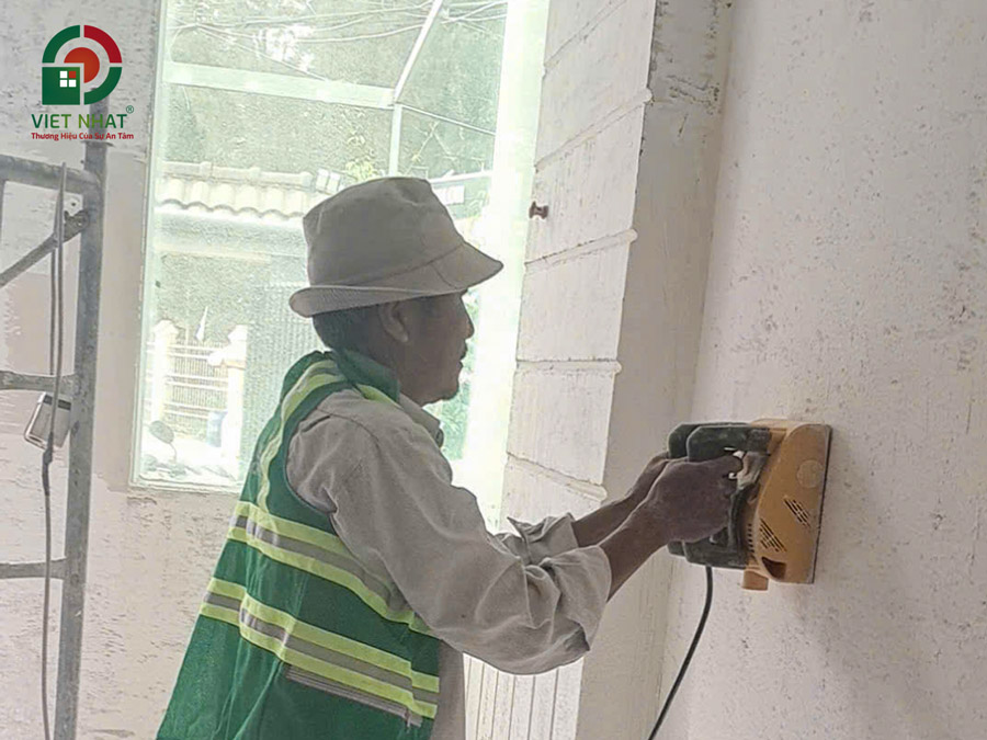 Hình ảnh thi công mài sơn tường