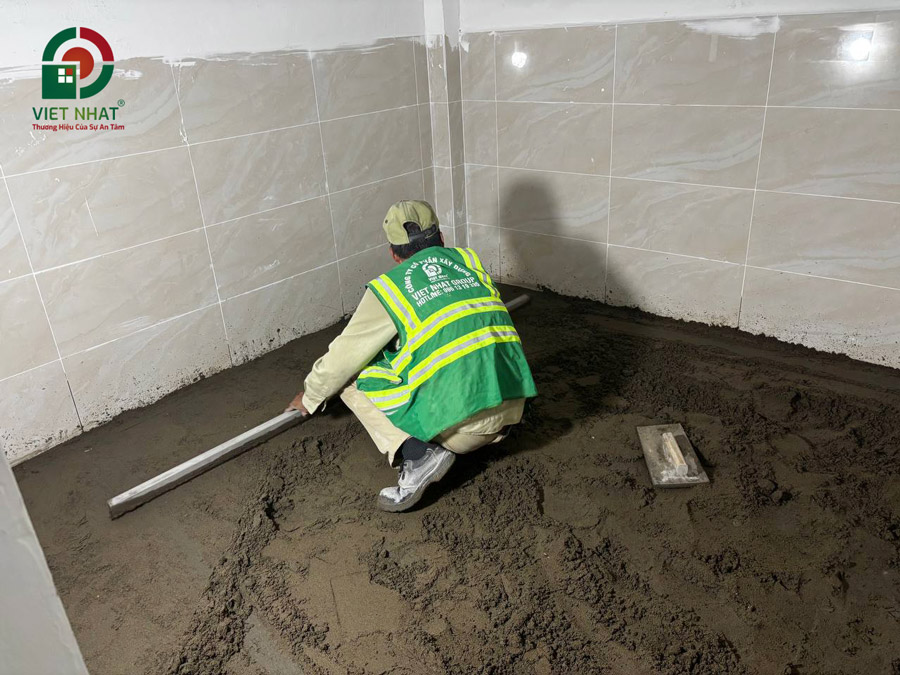 Hình ảnh thi công tráng nền ốp gạch