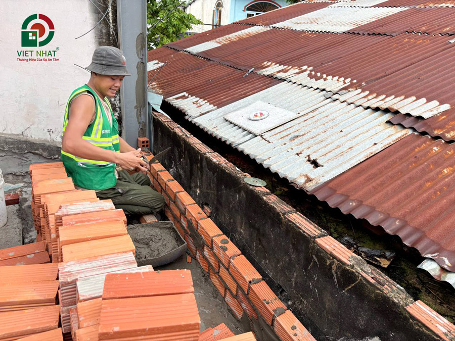 Hình ảnh thi công xây tường bao lầu 1
